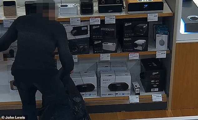 The John Lewis group, which includes the supermarket Waitrose, recently put its shoplifting losses at £12million. Pictured: Blatant shoplifters caught stealing speakers and clothes at John Lewis