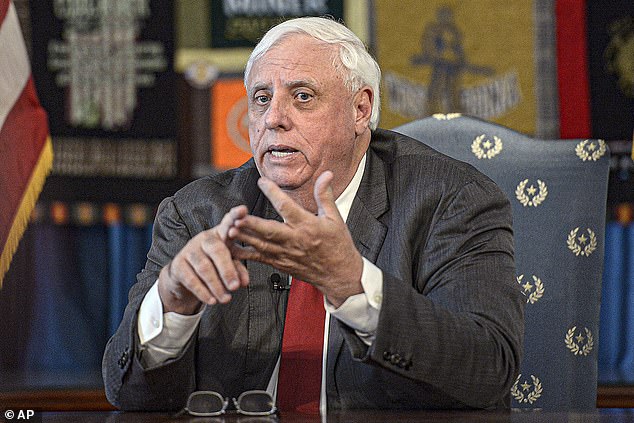 West Virginia Governor Jim Justice has filed a $1 billion lawsuit against a regional bank, accusing the lender of trapping his family businesses in a 'predatory' loan scheme